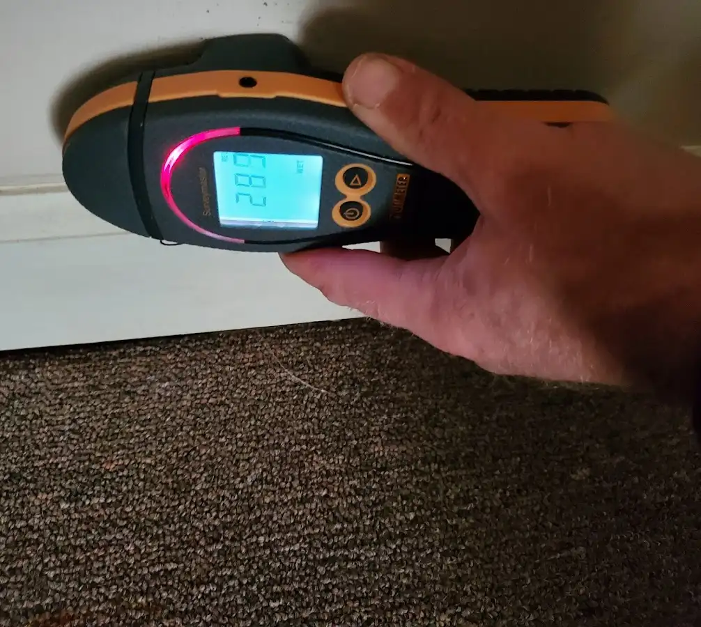 Moisture detection at baseboard during Storm Damage Restoration in Palo Alto